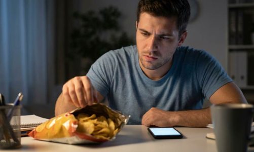 Person replacing unhealthy habits with a daily planner in Denver